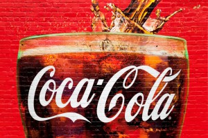 Warren Buffet vlastní významný podíl ve výrobci nápojů Coca-Cola. Ilustrační foto: Luciano Mortula / Shutterstock.com