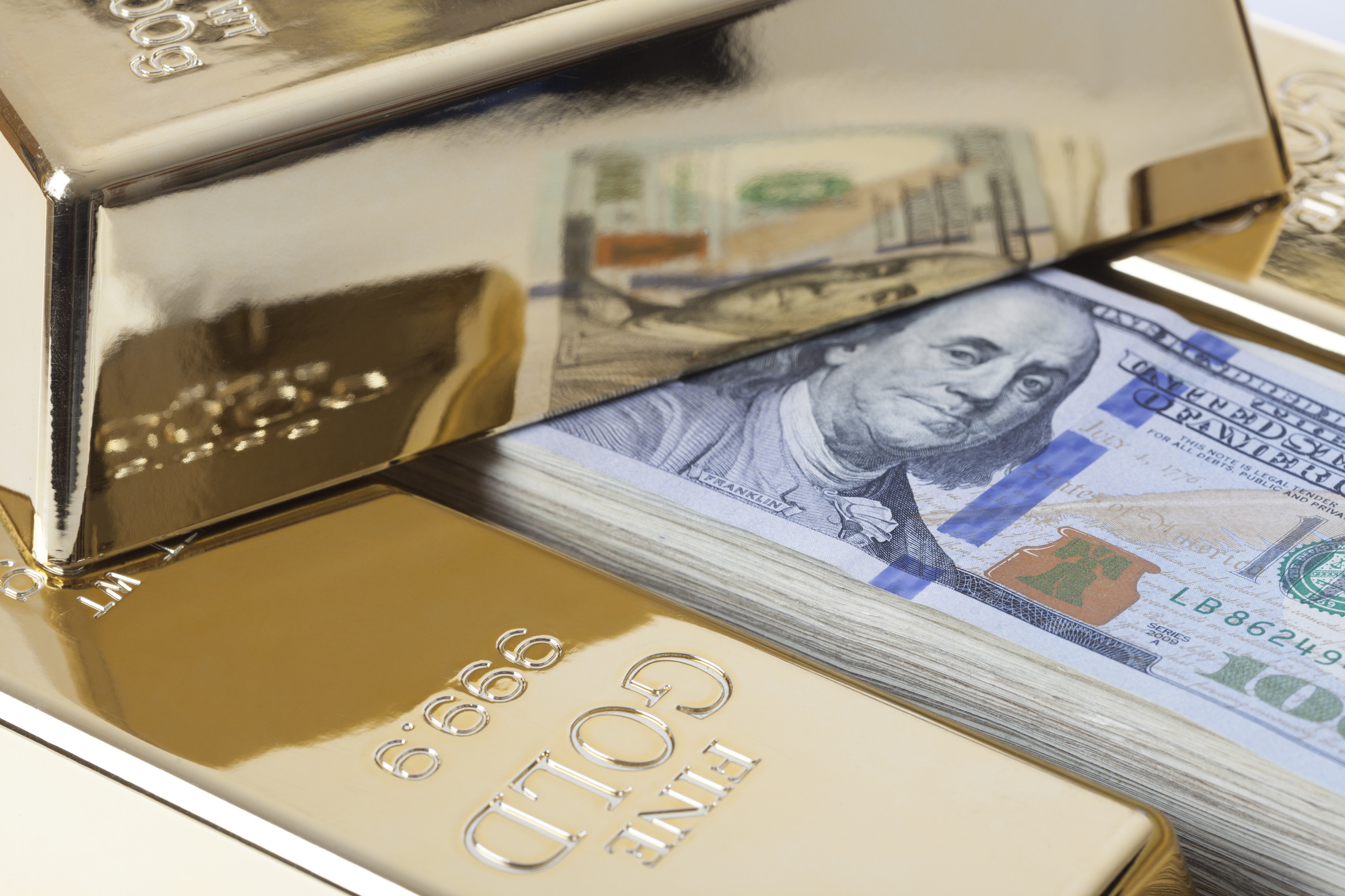 zlato-dolar_iStock-498074295.jpg